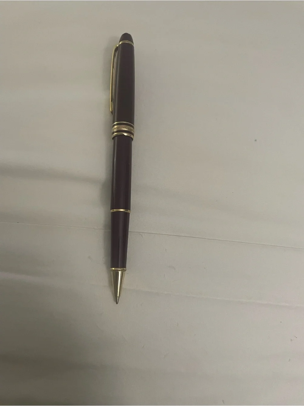 Montblanc Burgundy and Gold Pen.